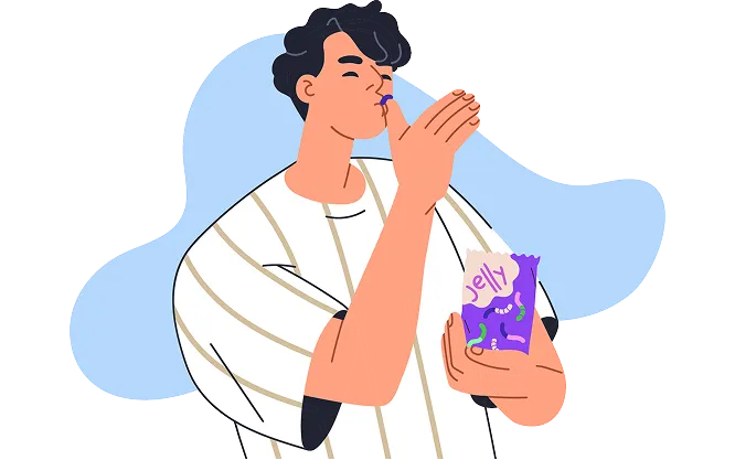 A person eating a sweet from a bag of jelly candy